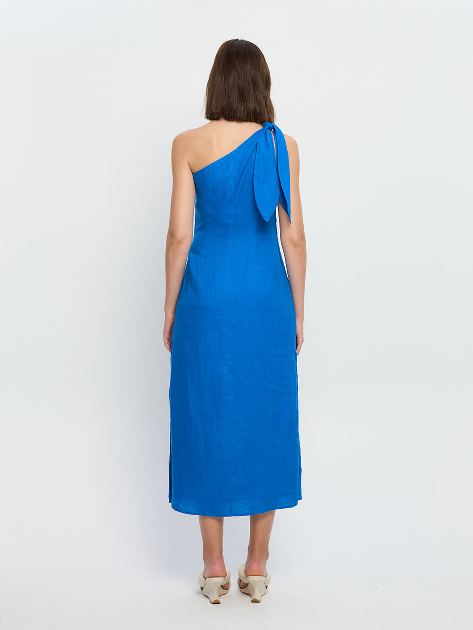 Addison Midi Dress Cobalt KIVARI | Model wears blue midi dress back view