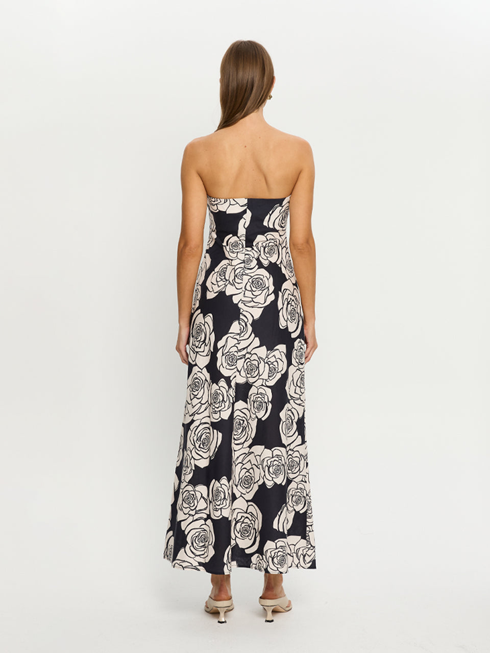 Carmen Strapless Maxi Dress KIVARI | Model wears navy and white floral strapless maxi dress back view