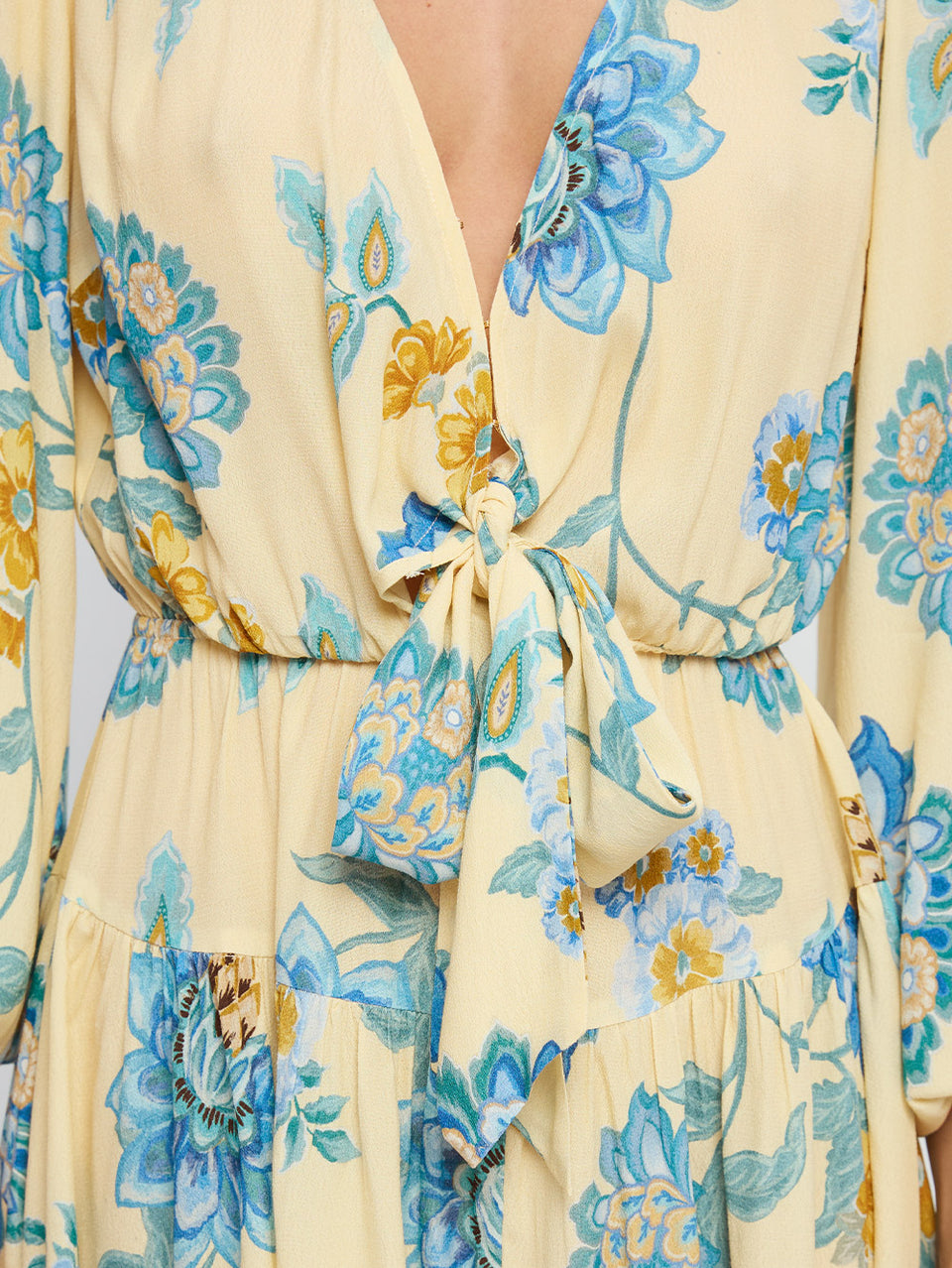 Giselle Tie Front Mini Dress KIVARI | Model wears blue and yellow tie front mini dress close up