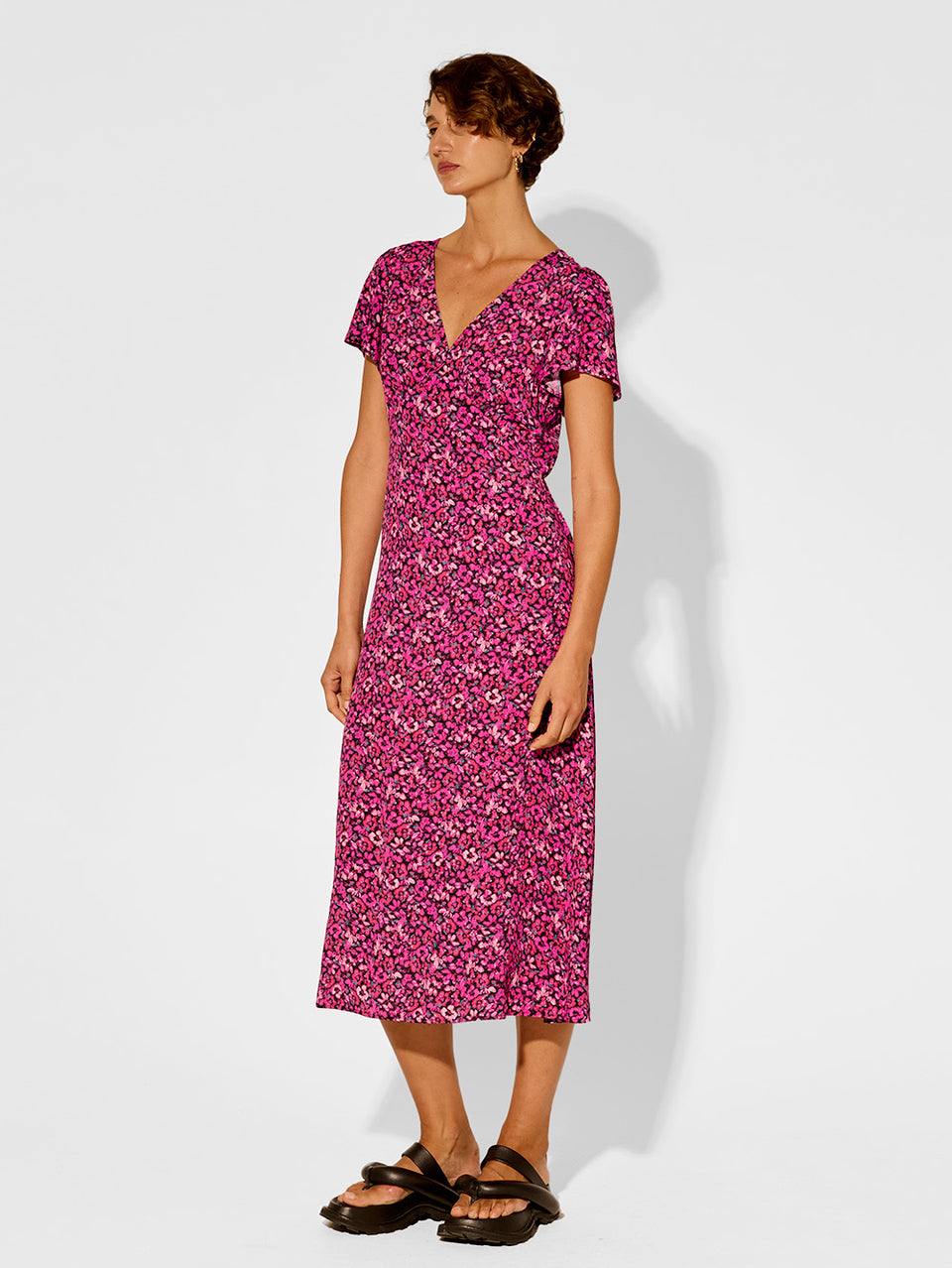 Imogen Midi Dress KIVARI | Model wears pink floral midi dress side view