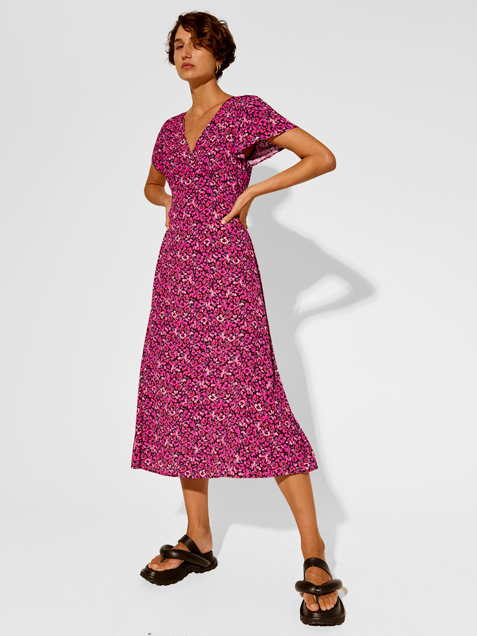 Imogen Midi Dress KIVARI | Model wears pink floral midi dress