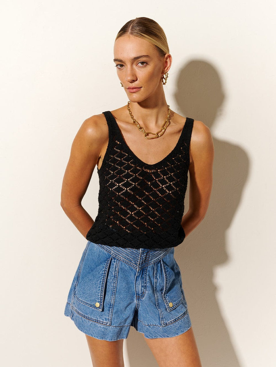 Irie Crochet Cami KIVARI | Model wears black crochet tank
