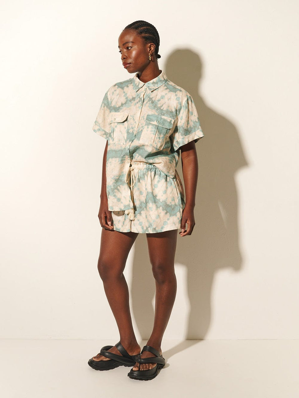 Mirage Short KIVARI | Model wears tie dye shorts with matching top side view