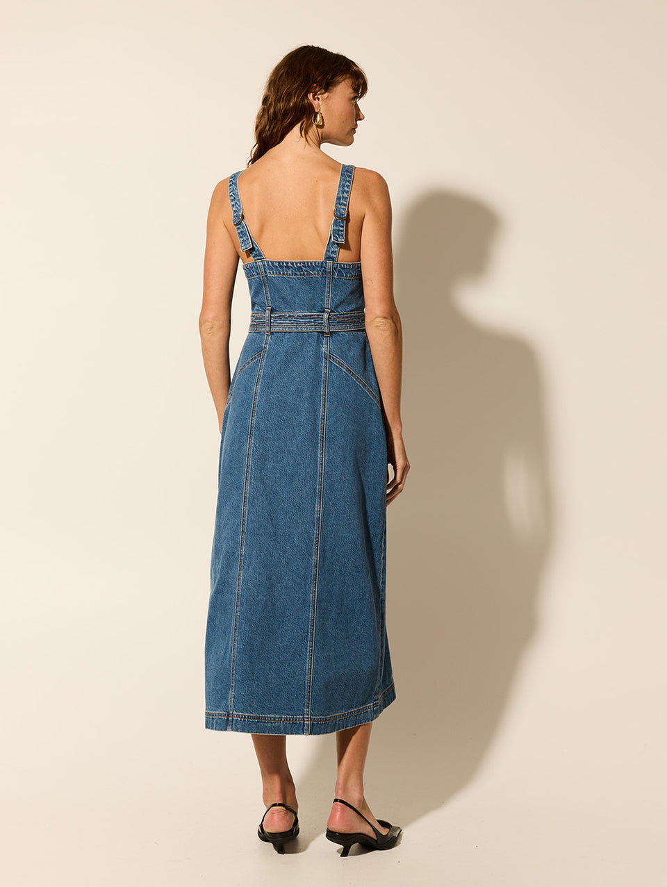 Nova Midi Dress KIVARI | Model wears denim midi dress back view