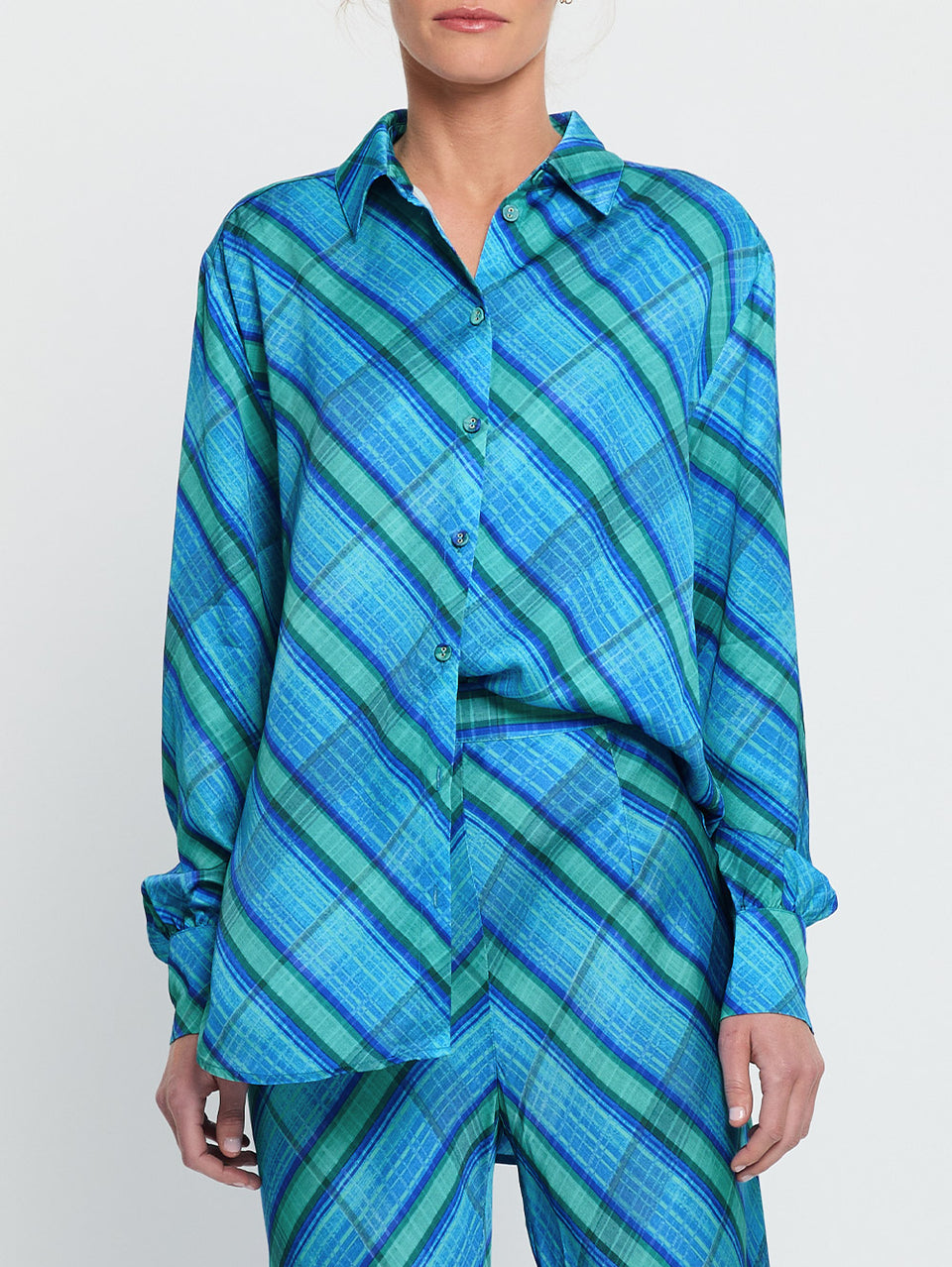Oceana Bias Pant KIVARI | Model wears blue check print bias cut pant close up