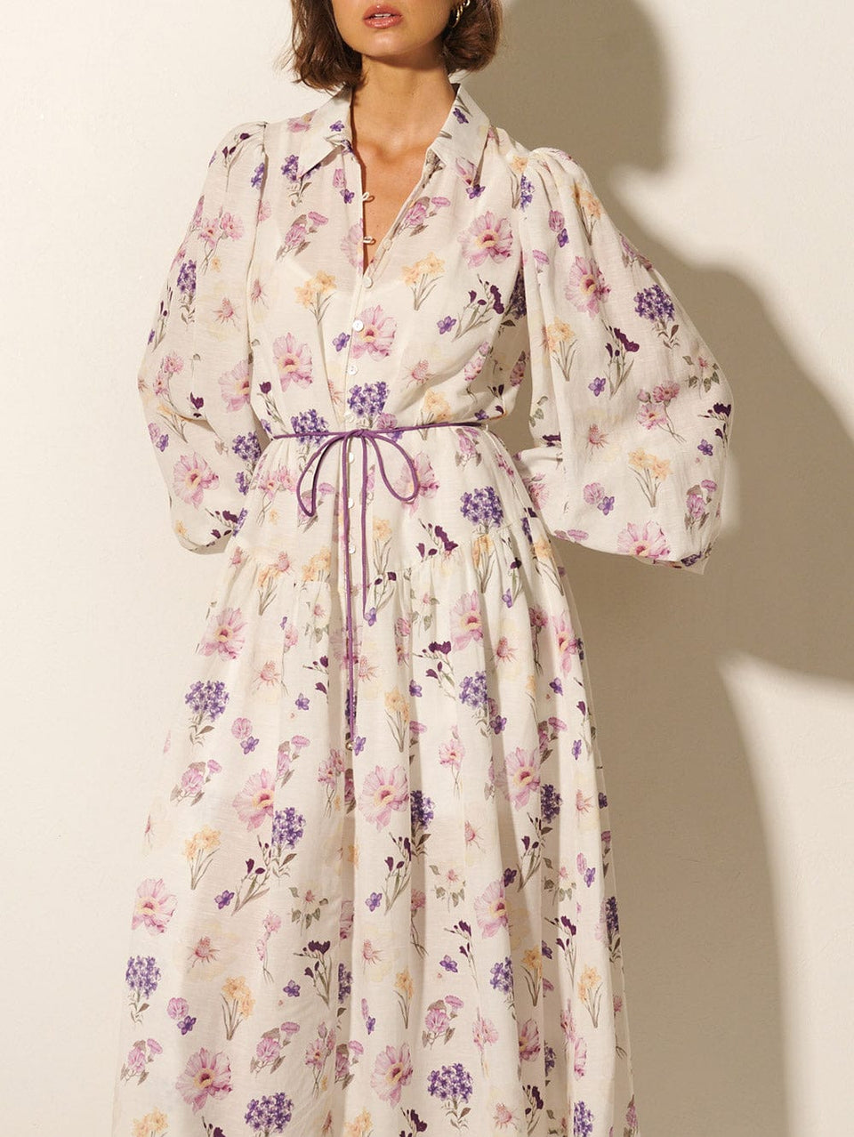 Phoebe Midi Dress KIVARI | Model wears ivory and purple floral midi dress close up