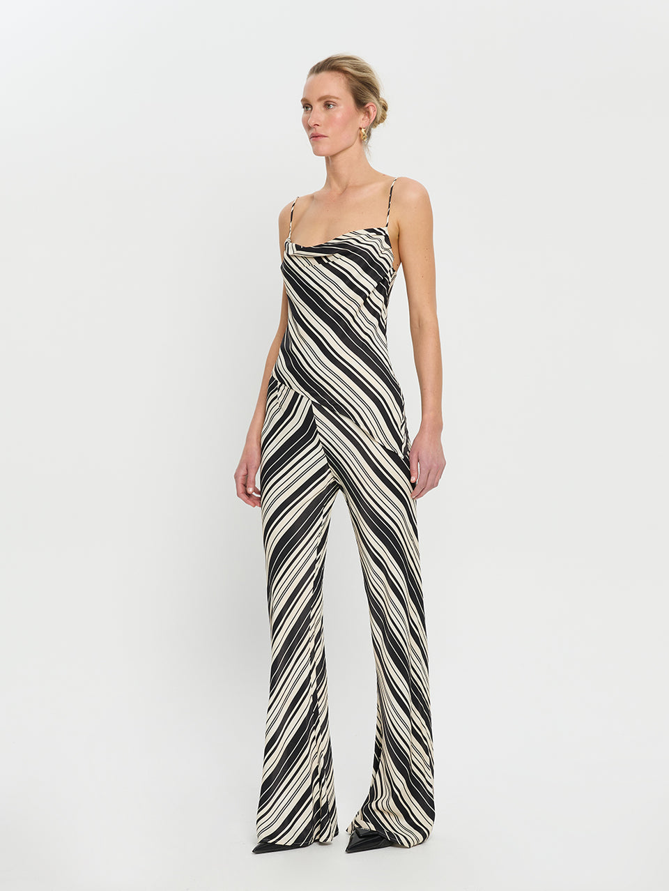 Sara Bias Pant KIVARI | Model wears stripe pant side view