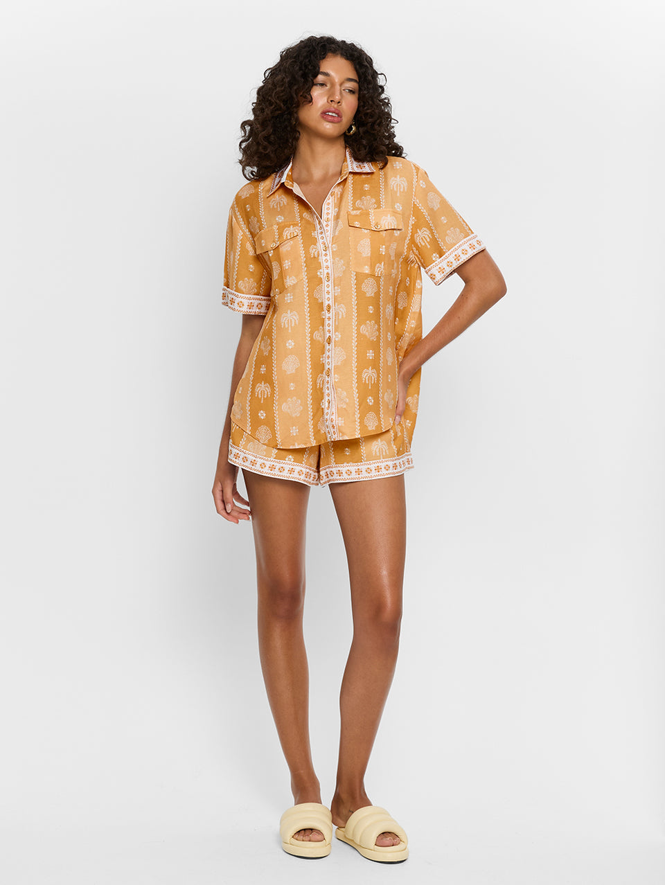 Sienna Shirt KIVARI | Model wears orange print shirt