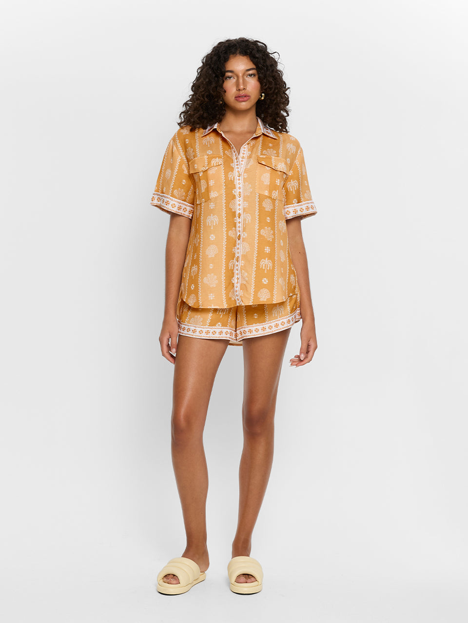 Sienna Shirt KIVARI | Model wears orange print shirt