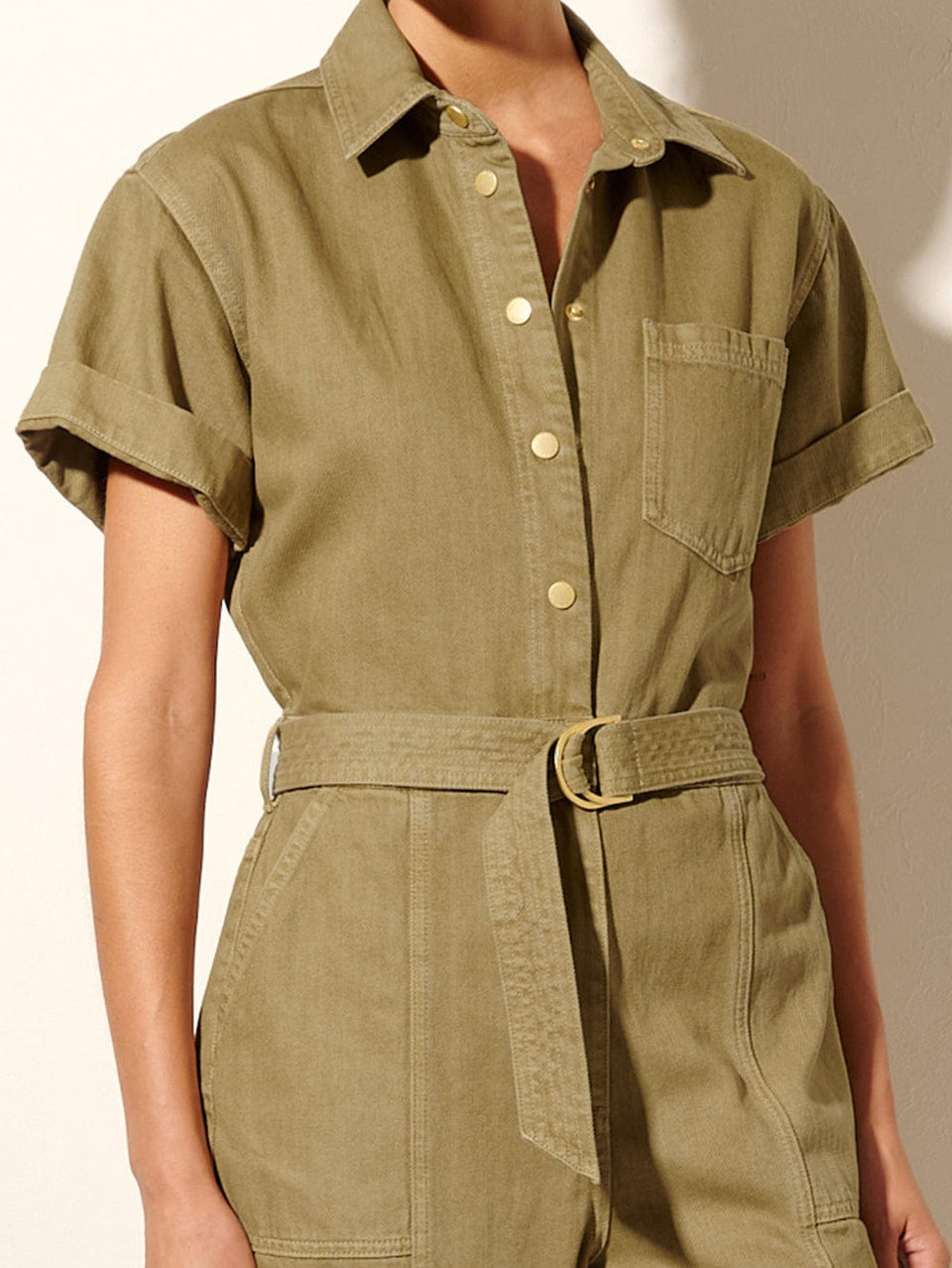 Tahlia Boilersuit Khaki KIVARI | Model wears khaki green denim boilersuit close up