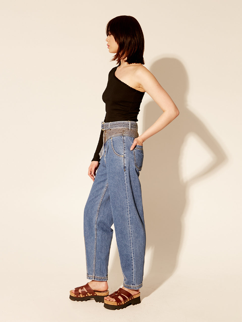 Tallulah One Shoulder Top Black KIVARI | Model wears black one shoulder top side view