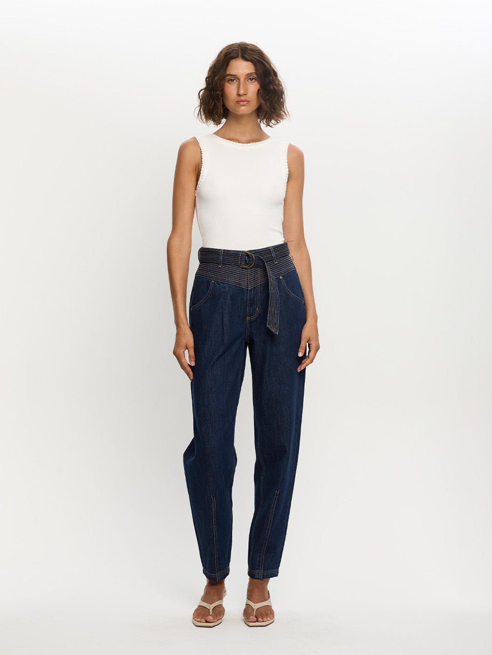 Woman in blue jean with belt 