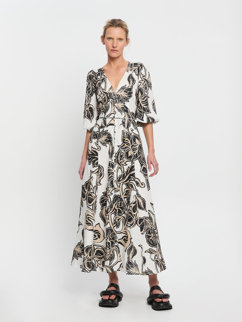 Alma Maxi Dress KIVARI | Model wears black and white floral maxi dress