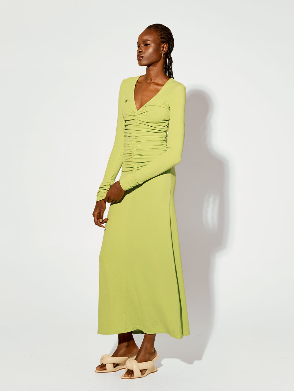 Amal Maxi Dress KIVARI | Model wears lime green maxi dress side view