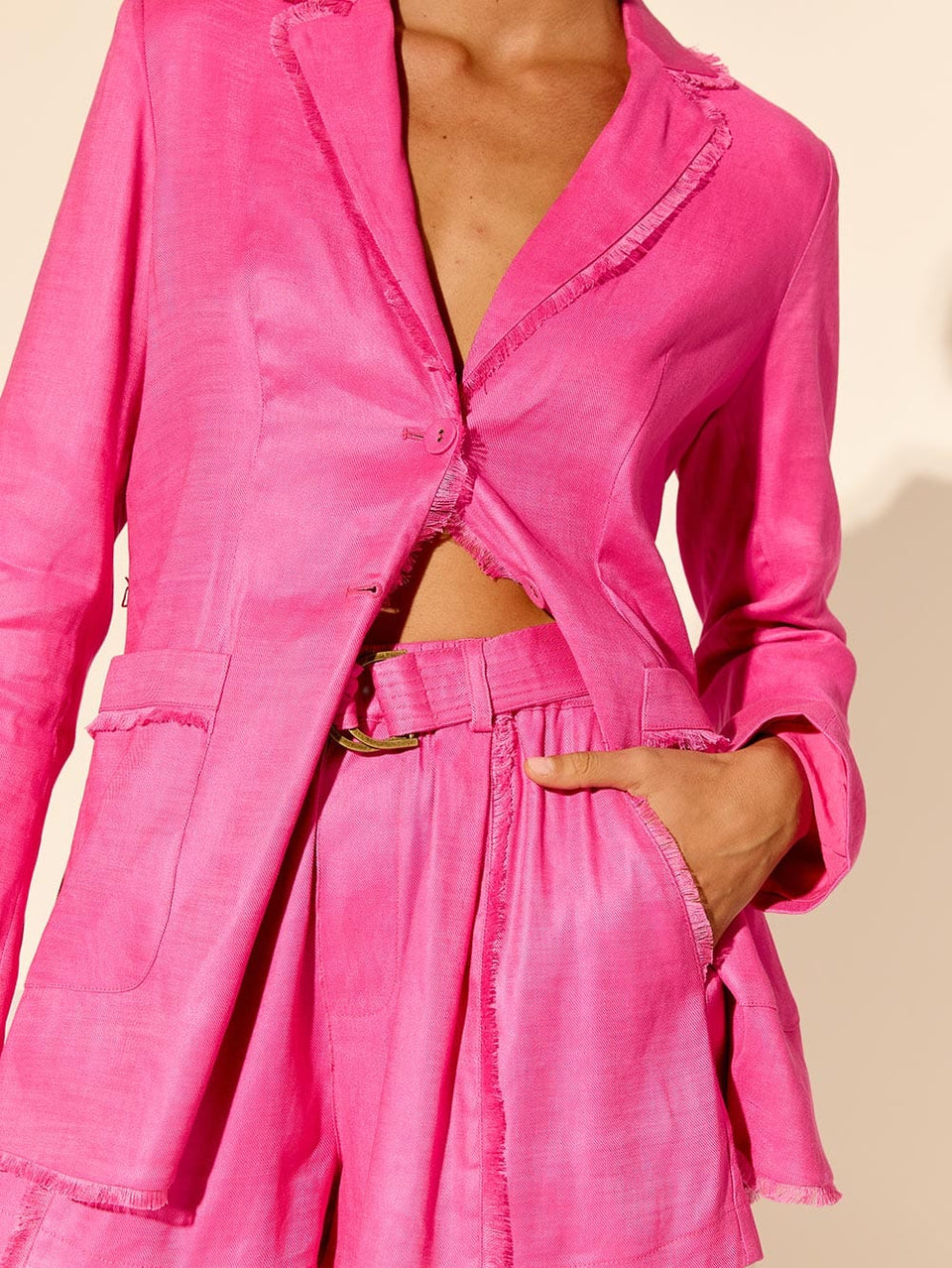 Angelina Short Pink KIVARI | Model wears hot pink short close up
