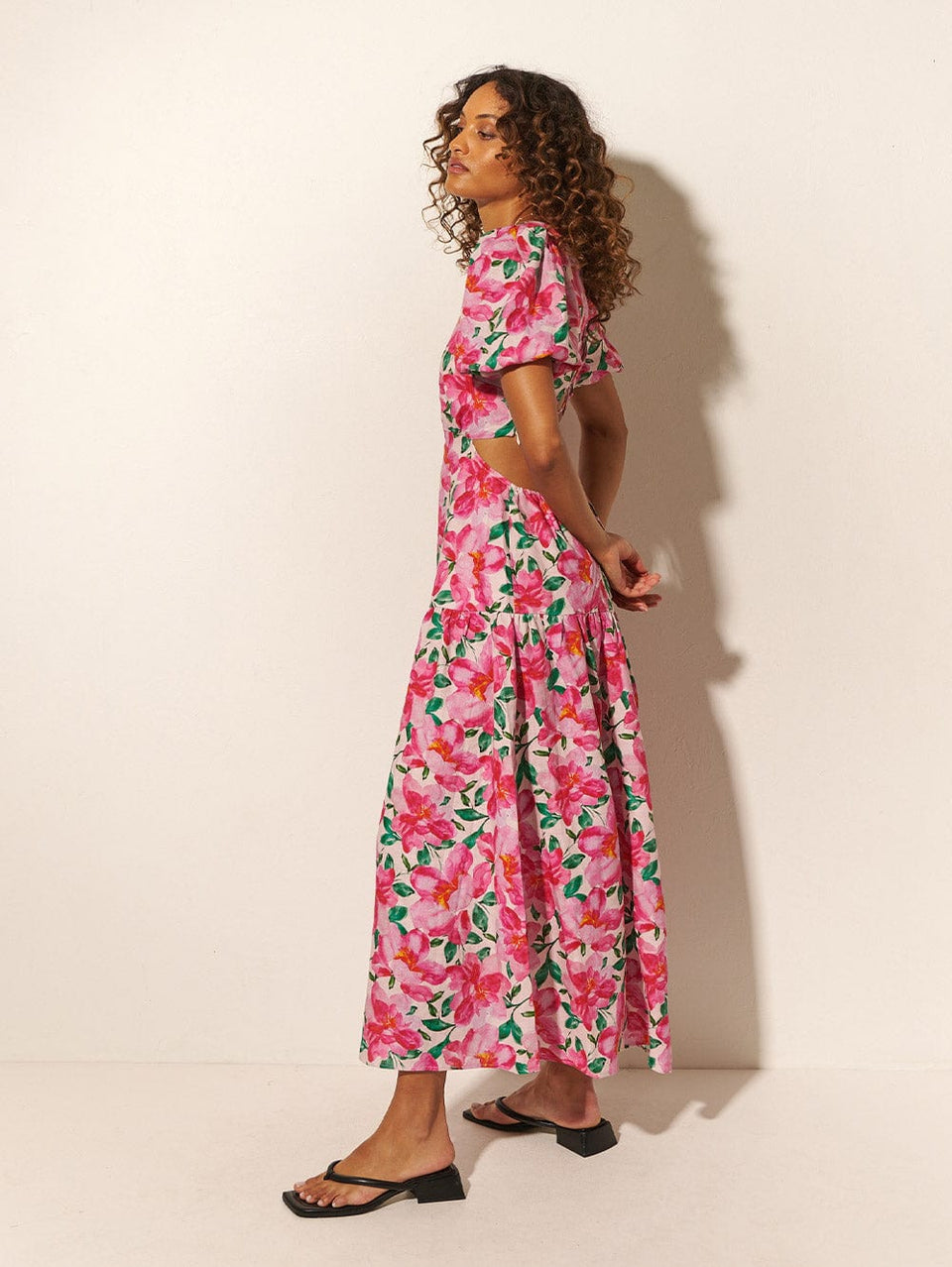 KIVARI Antonia Maxi Dress | Model wearing Pink and Green Floral Dress Side Profile