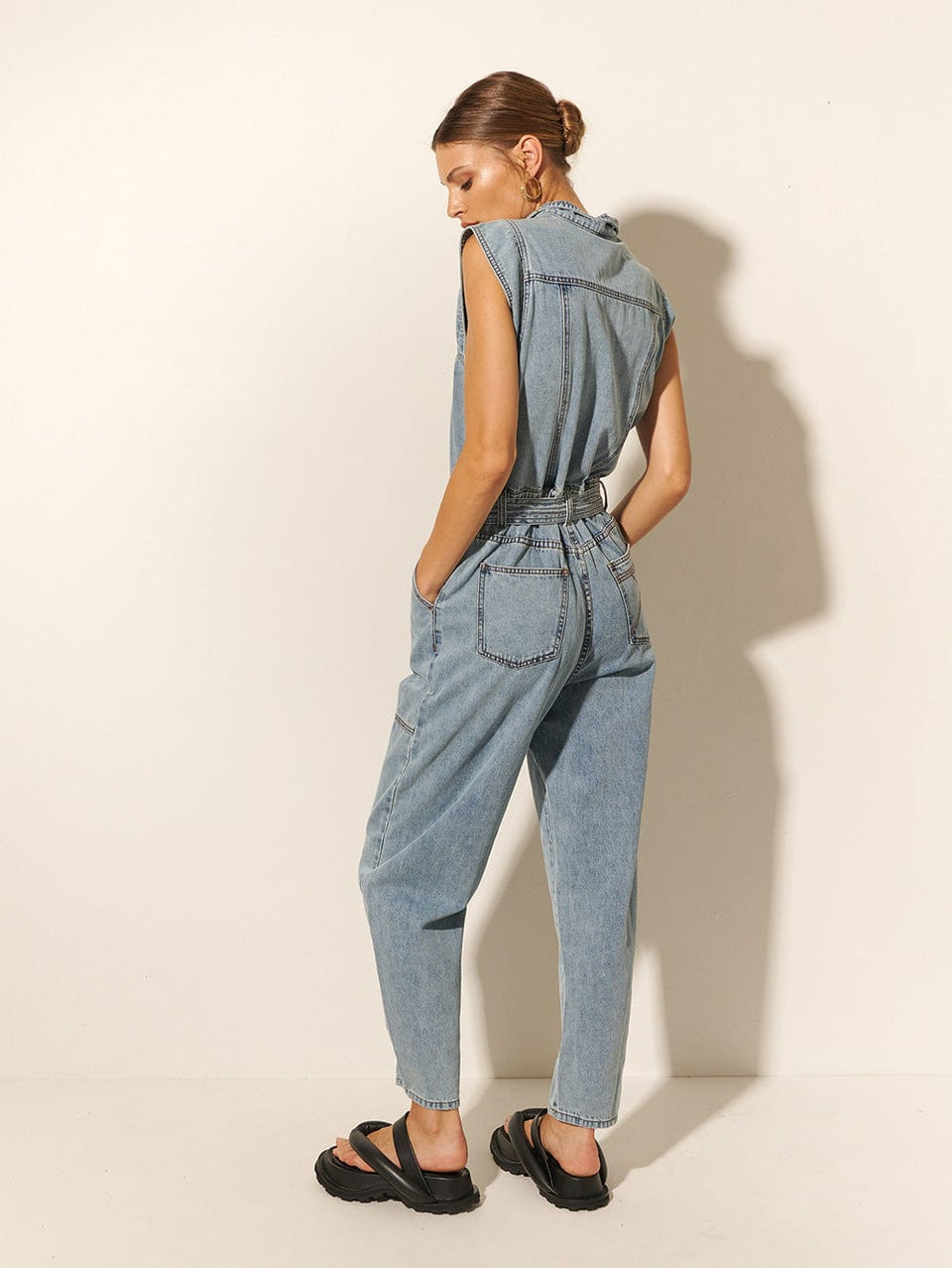KIVARI Azalia Boilersuit | Model wearing Denim Boilersuit Back View