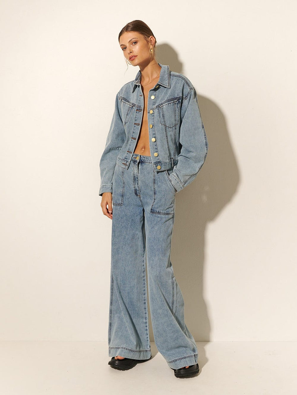 KIVARI Azalia High Waisted Jean | Model wearing Blue Denim High Waisted Jeans