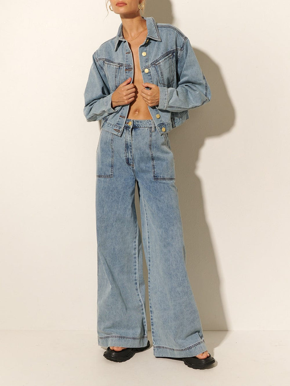 KIVARI Azalia High Waisted Jean | Model wearing Blue Denim High Waisted Jeans
