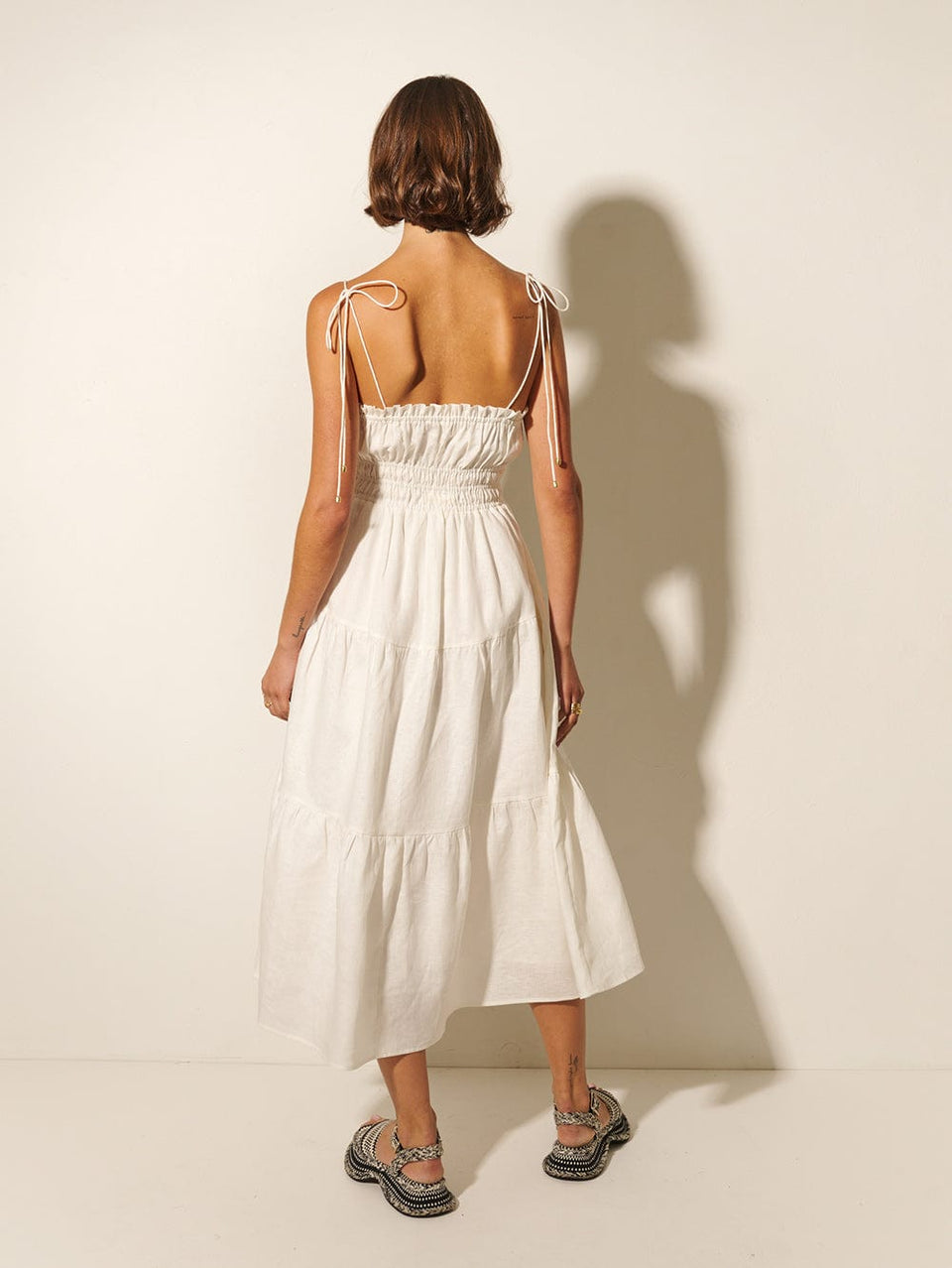 Corine Midi Dress KIVARI | Model wears ivory midi dress back view