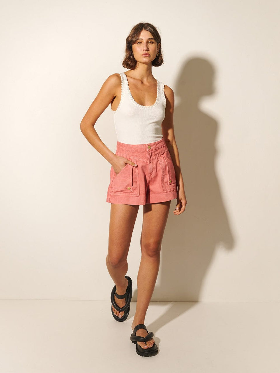 Celene Short KIVARI | Model wears pink denim shorts