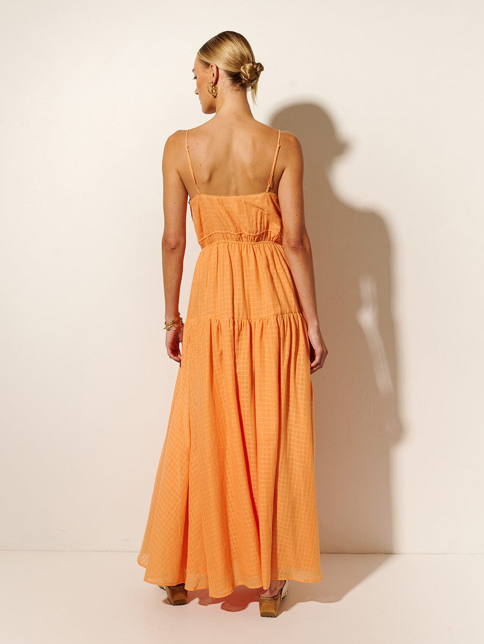 KIVARI Chantelle Maxi Dress | Model wears Peach Maxi Dress Back View
