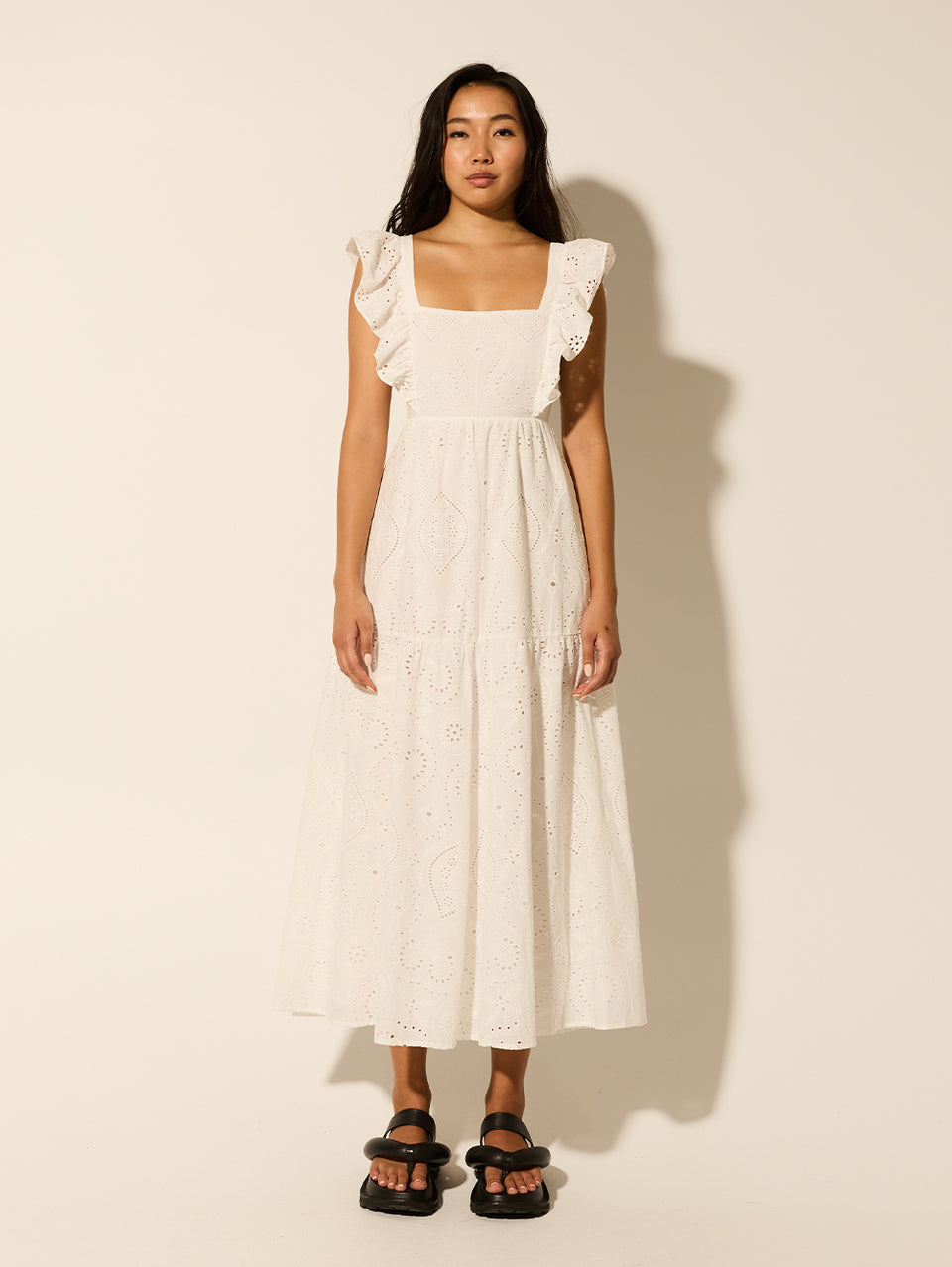Clove Midi Dress KIVARI | Model wears white embroidered midi dress