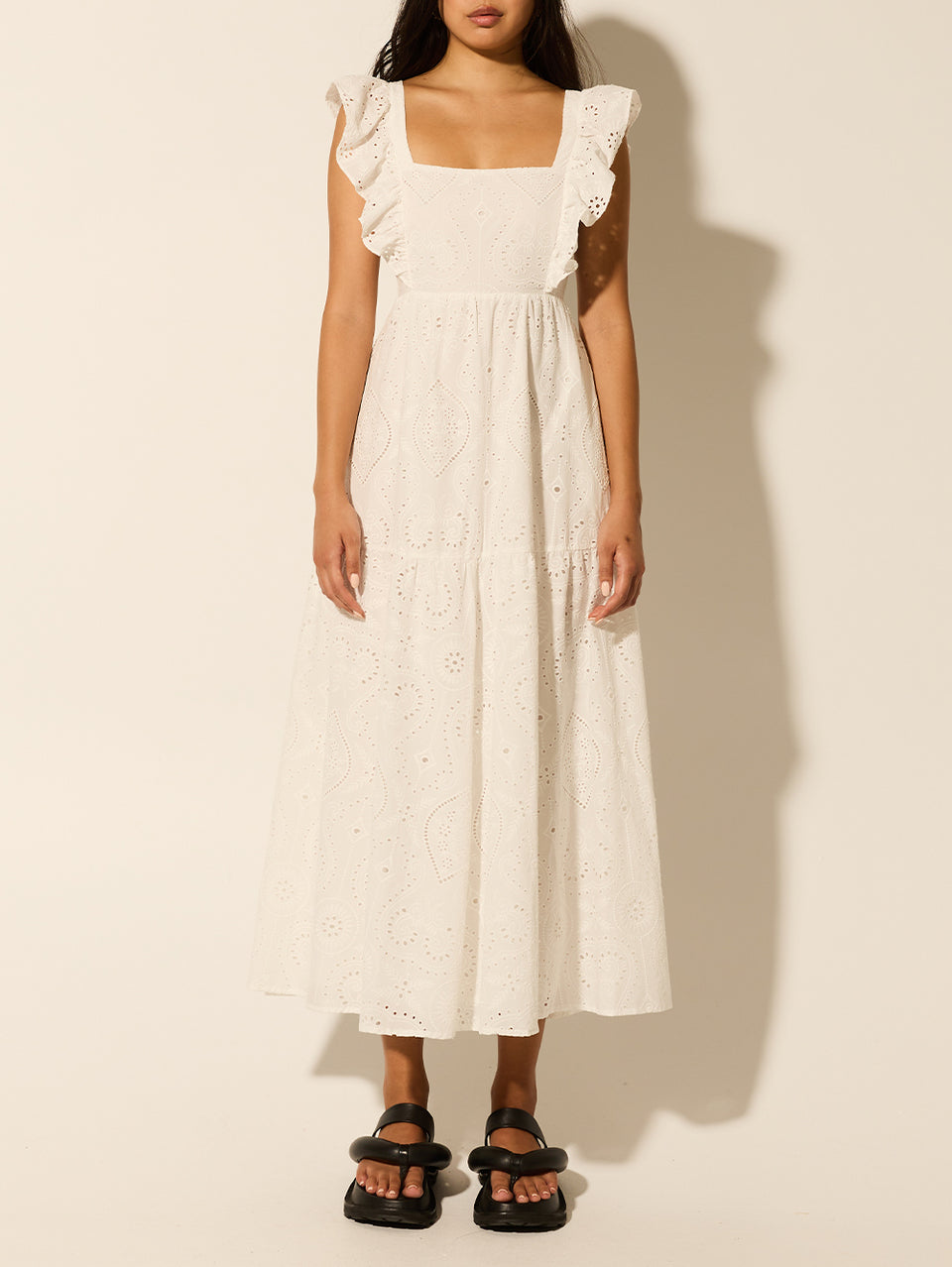 Clove Midi Dress KIVARI | Model wears white embroidered midi dress 