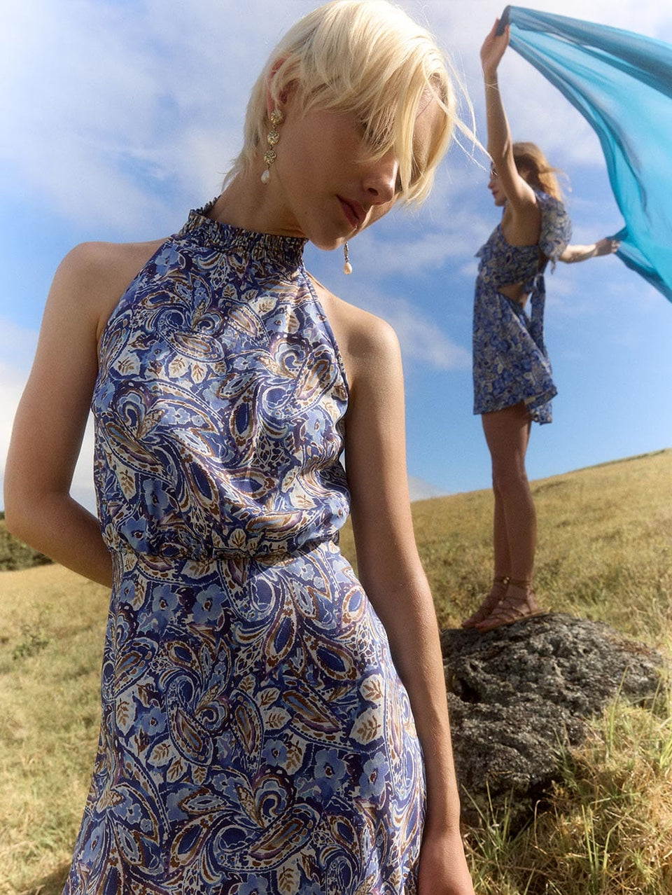 Dakota Halter Maxi Dress KIVARI | Model wears blue paisley halter dress campaign