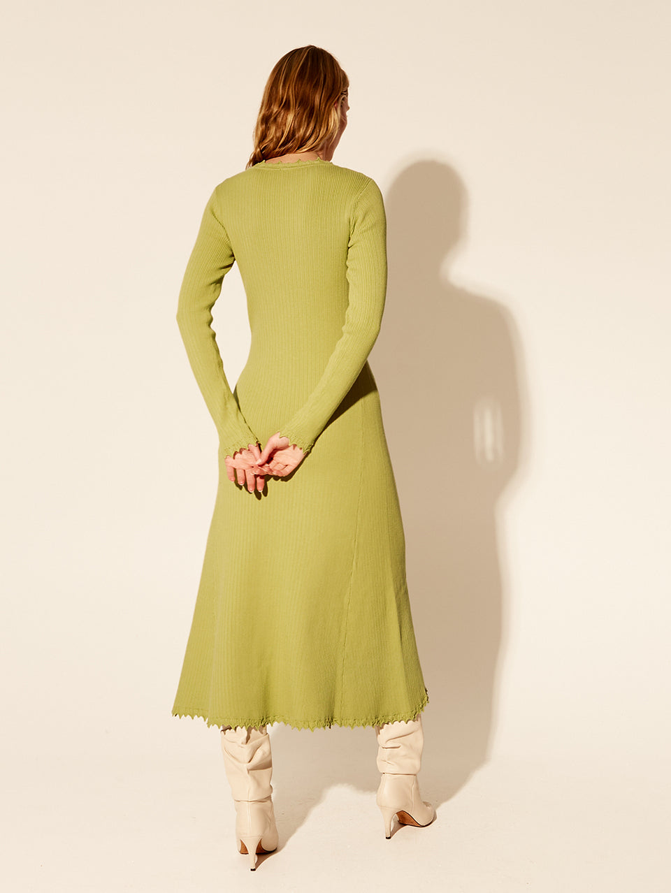 Model wearing KIVARI Diana Knit Dress, back view