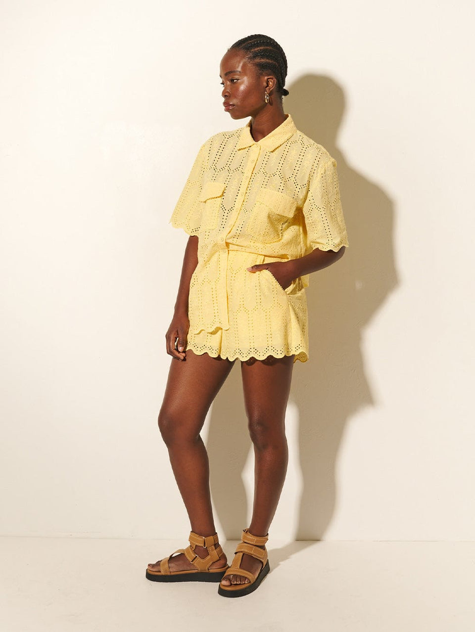 Estelle Short KIVARI | Model wears yellow shorts side view