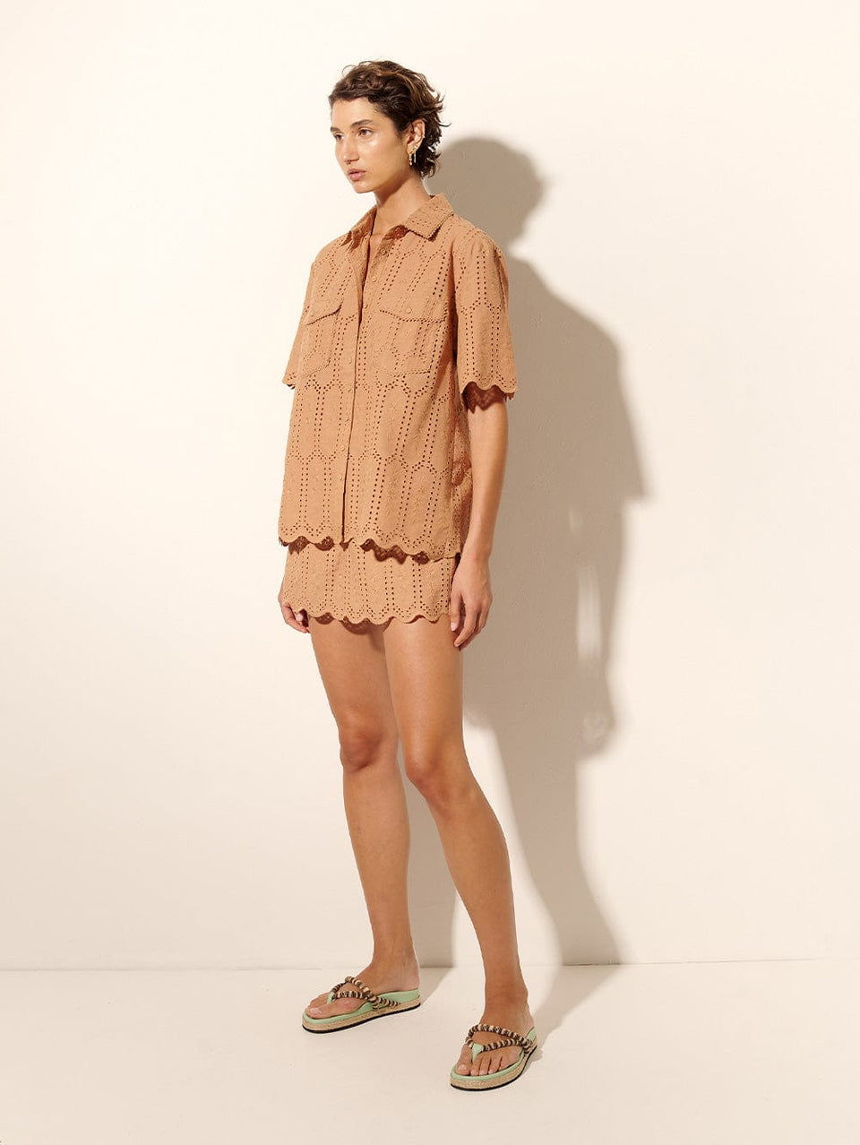 Estelle Short Mocha KIVARI | Model wears brown shorts with lace detail side view
