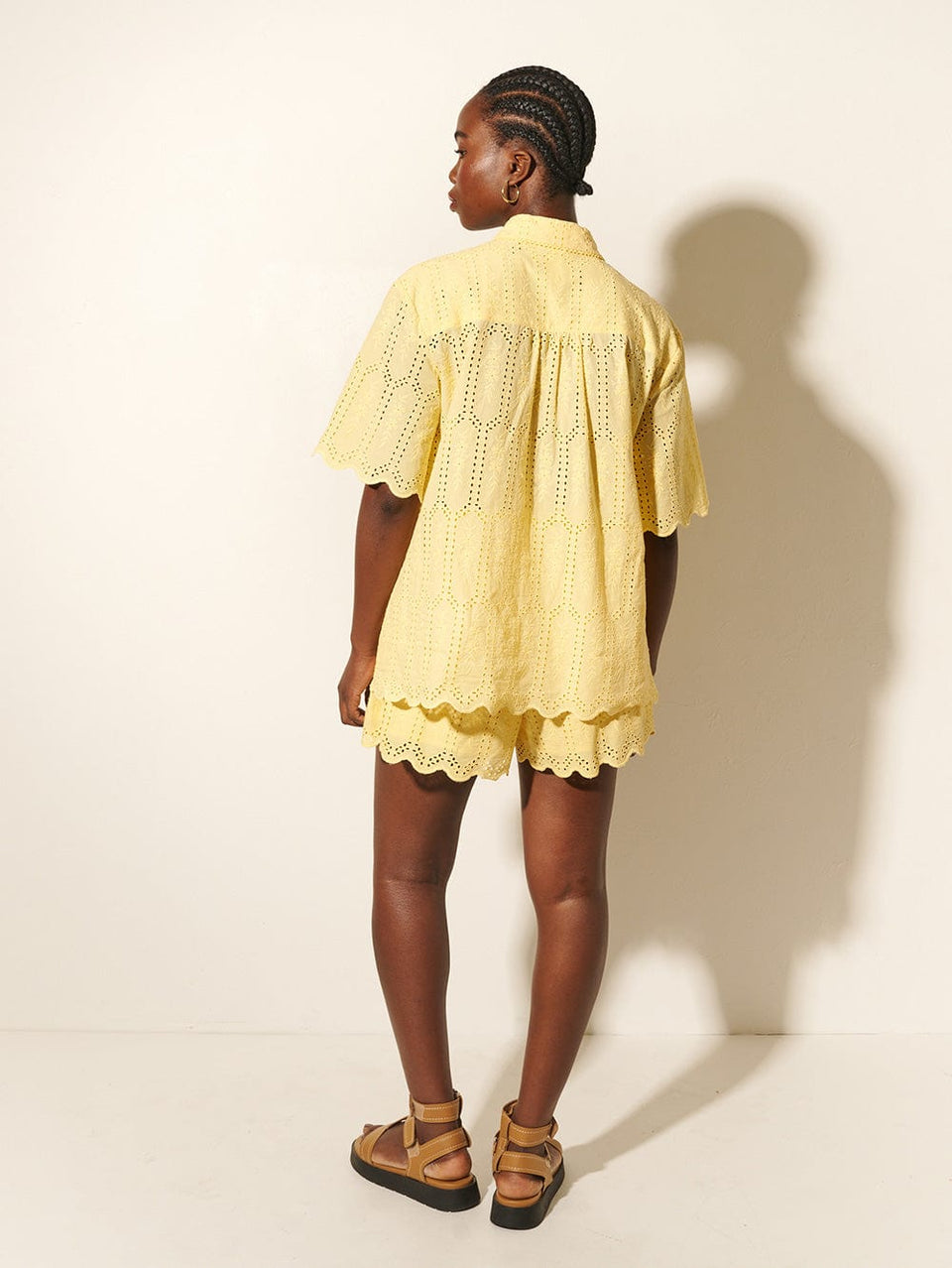 Estelle Short KIVARI | Model wears yellow shorts back view