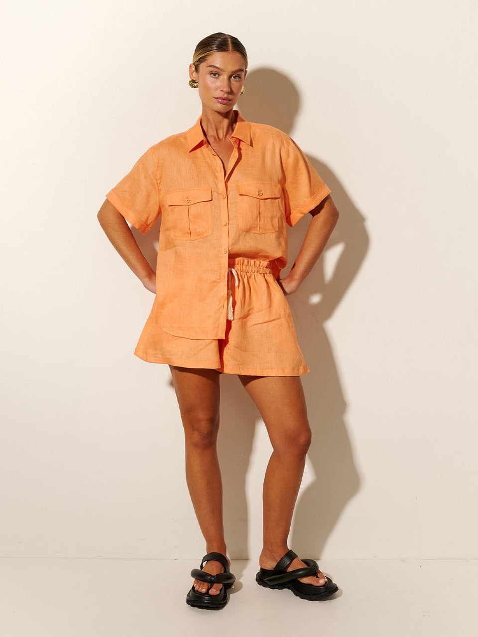 KIVARI Eve Shirt | Model wearing Orange Shirt