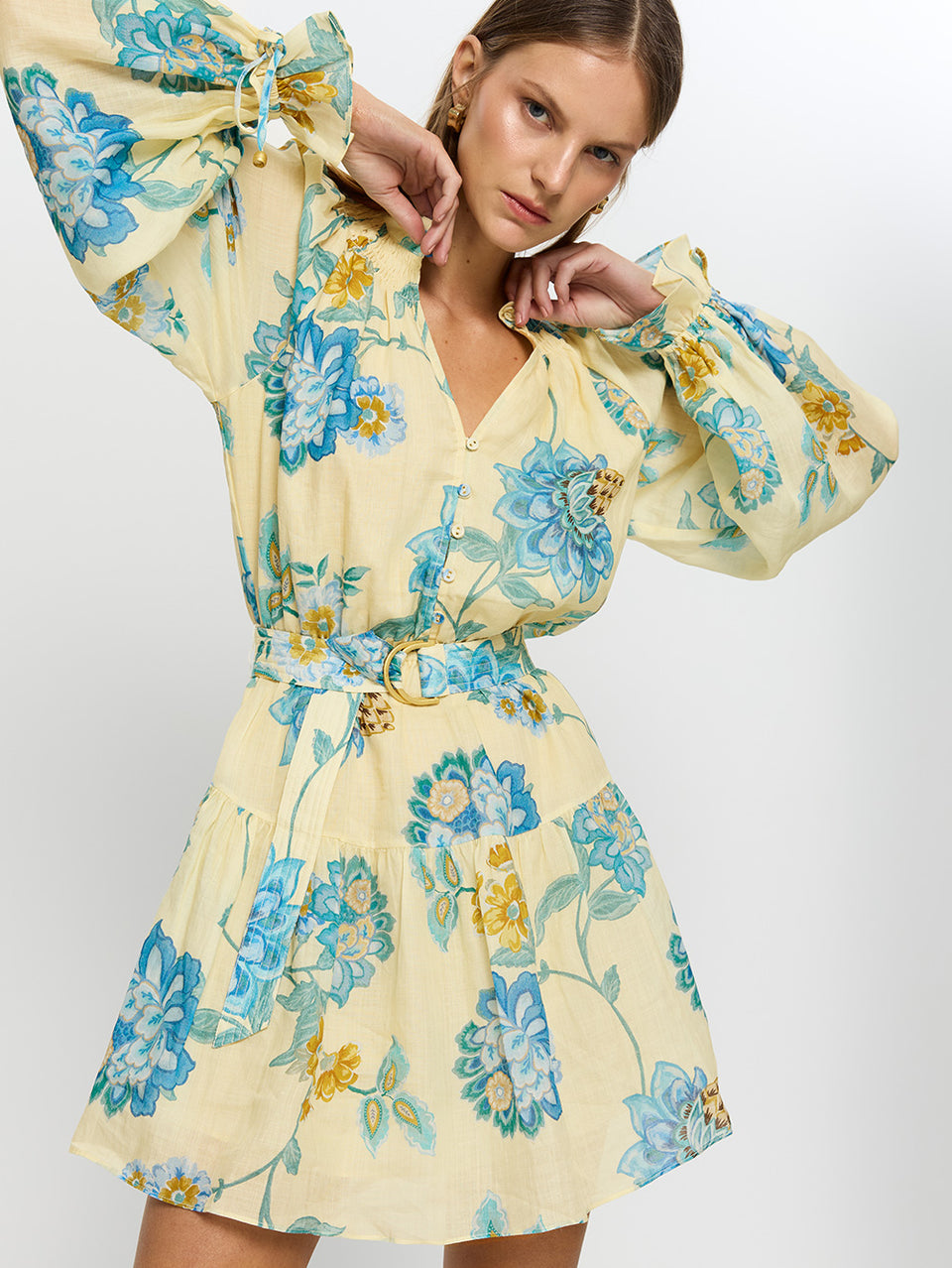 Giselle Blouson Mini Dress KIVARI | Model wears yellow and blue floral mini dress