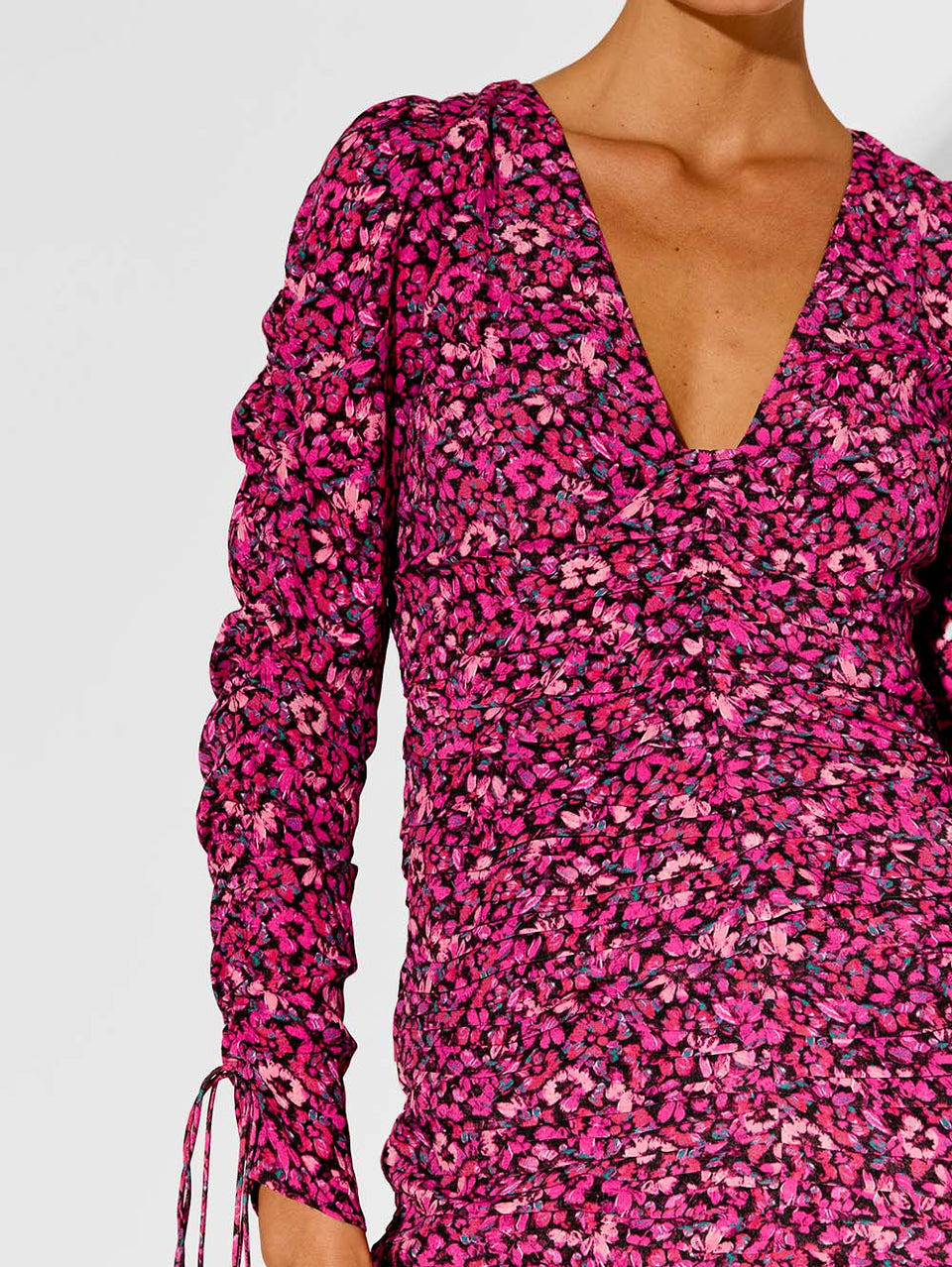 Imogen Mini Dress KIVARI | Model wears pink floral mini dress close up