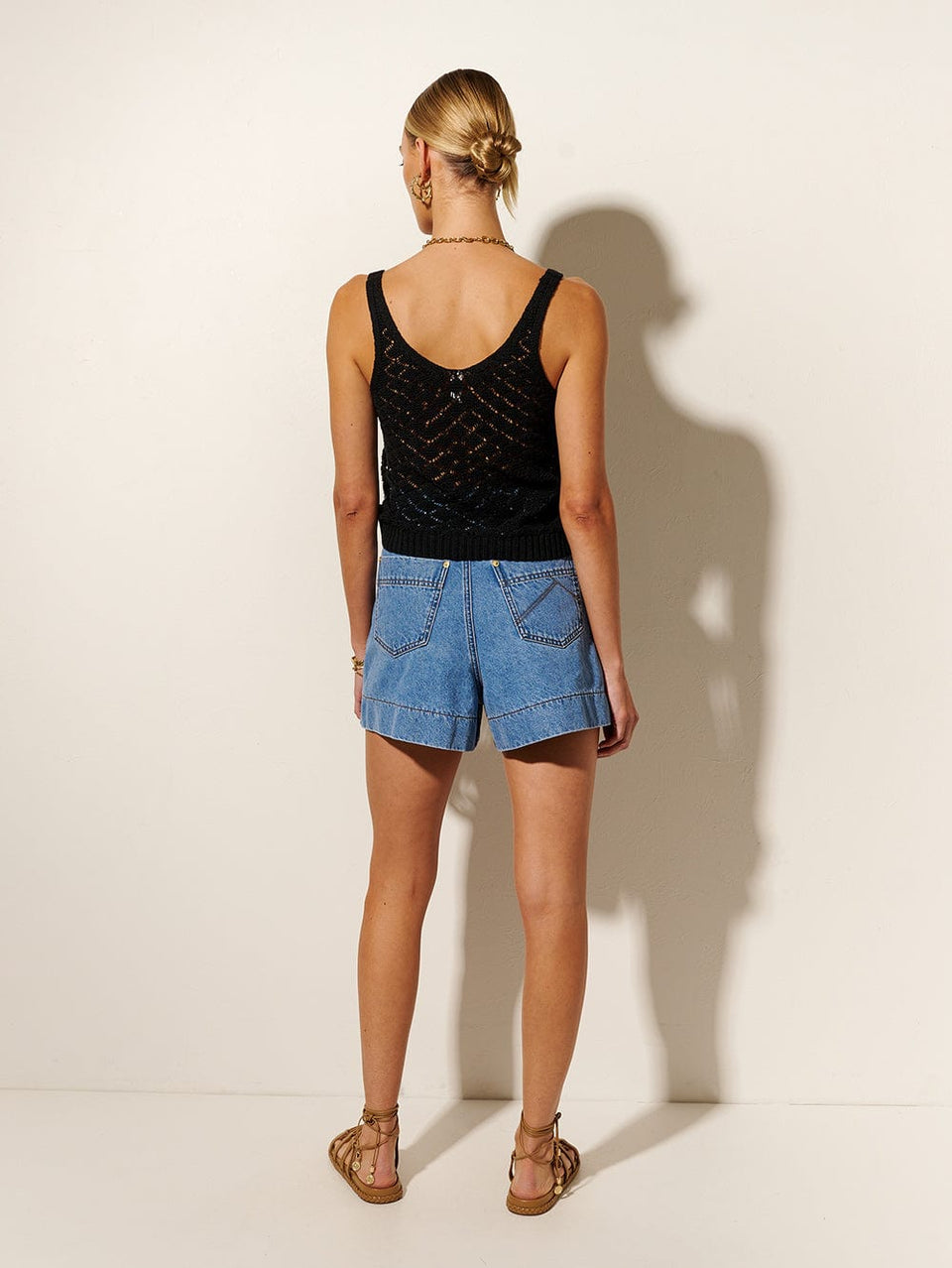Irie Crochet Cami KIVARI | Model wears black crochet tank back view