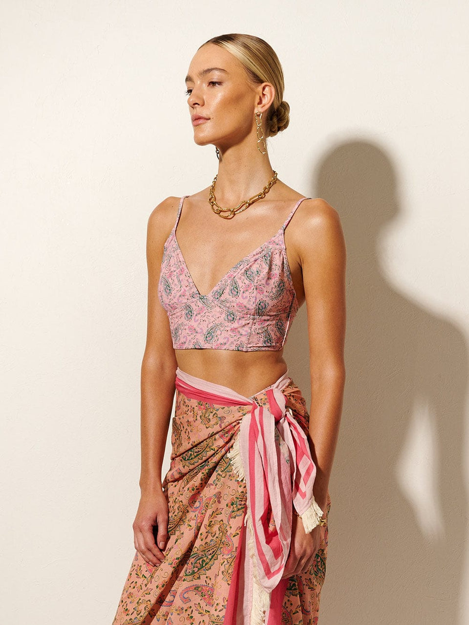 Isha Panelled Bikini Top KIVARI | Model wears pink paisley bikini top close up