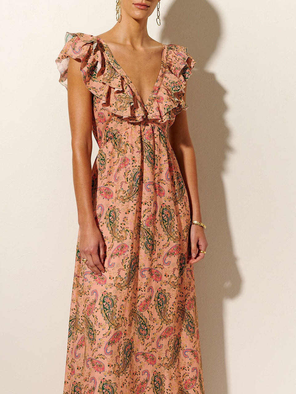 Isha Ruffle Maxi Dress KIVARI | Model wears ruffle pink paisley maxi dress 