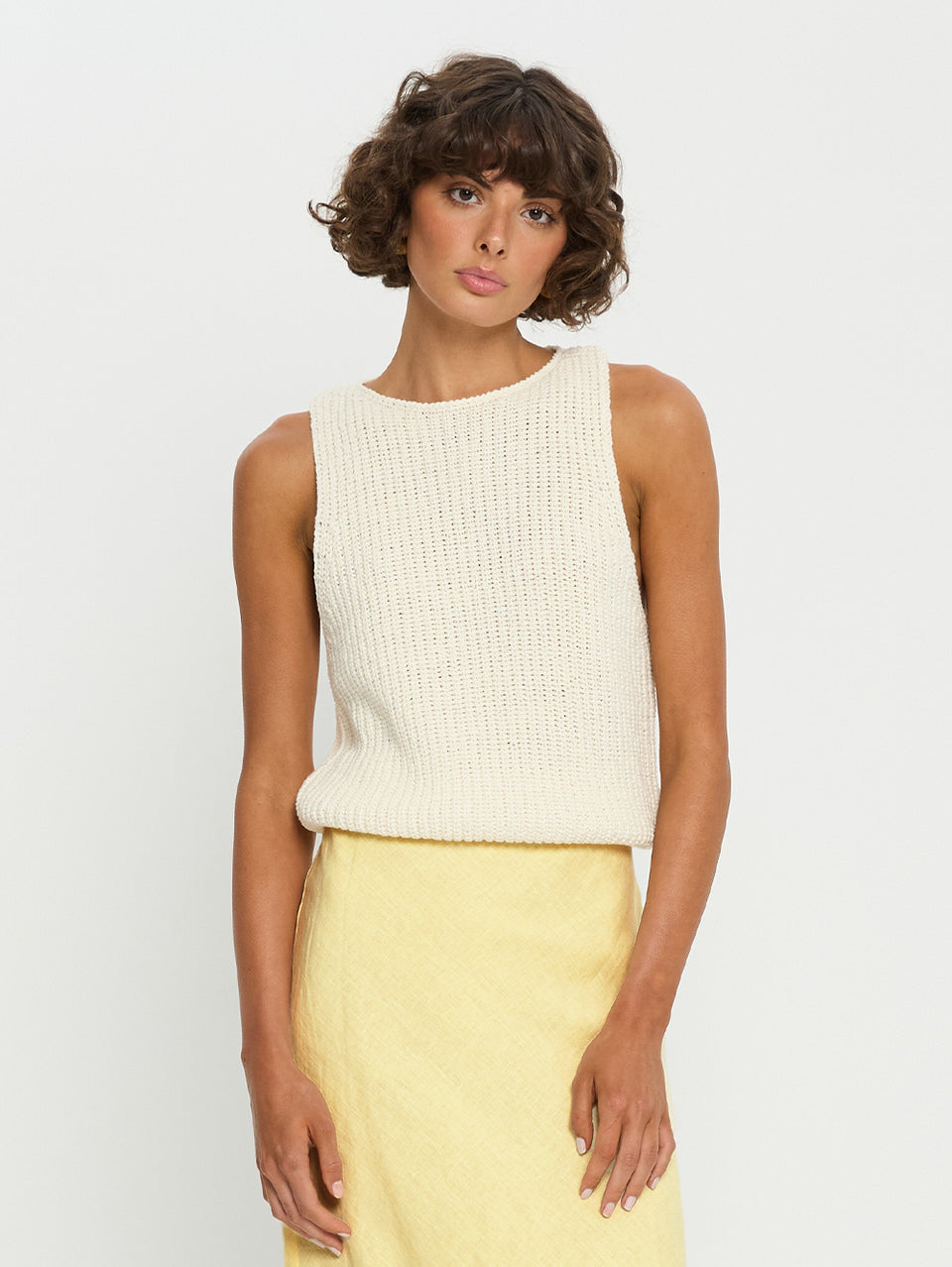 Ivy Knit Cami - Ivory | Model wearing ivory cami with yellow skirt