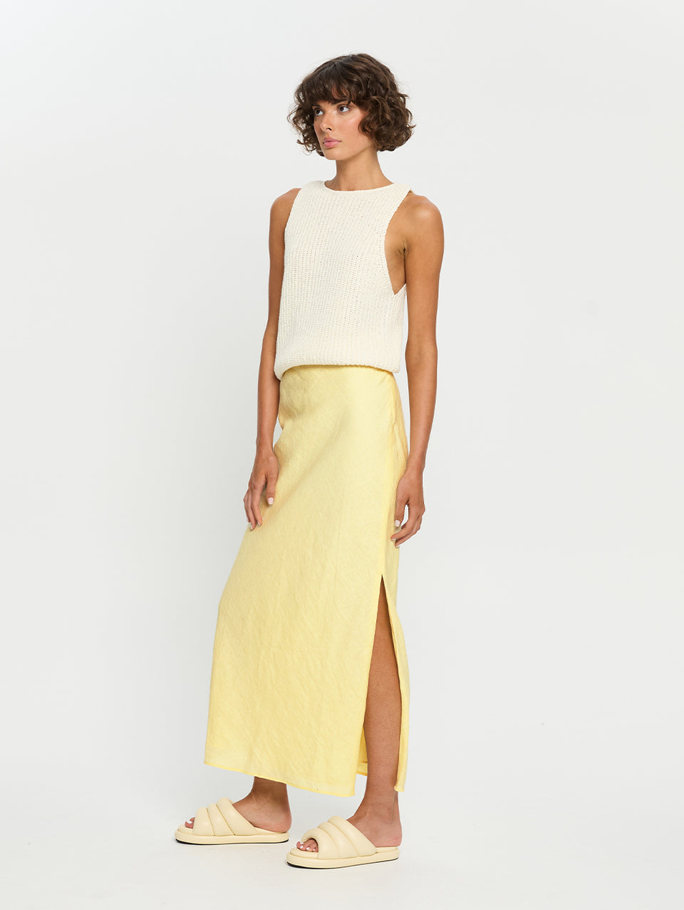 Ivy Knit Cami - Ivory | Model wearing ivory cami with yellow skirt