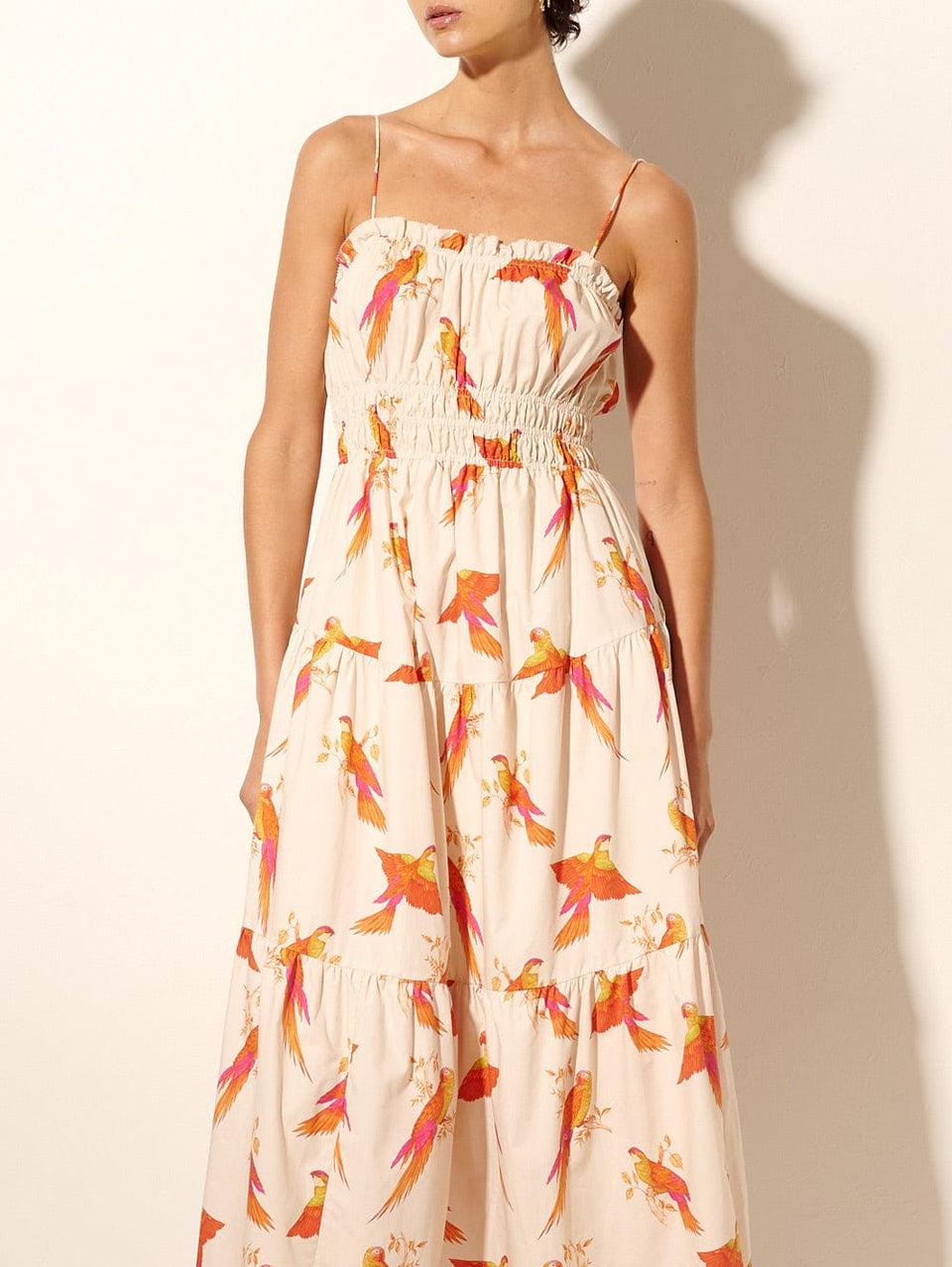 Kaylee Midi Dress KIVARI | Model wears pink and orange bird print midi dress close up