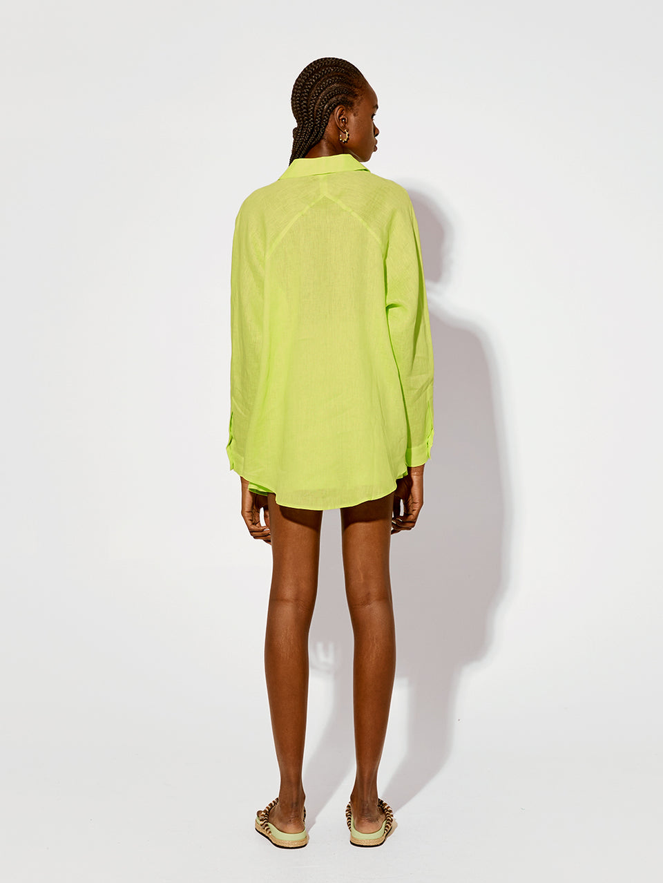 Leona Short Lime KIVARI | Model wears lime green linen shorts back view