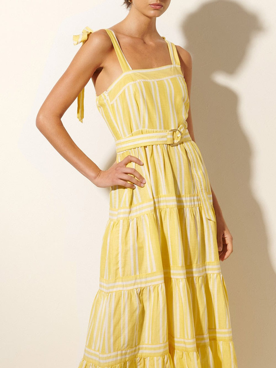 Lola Maxi Dress KIVARI | Model wears yellow and white striped maxi dress close up