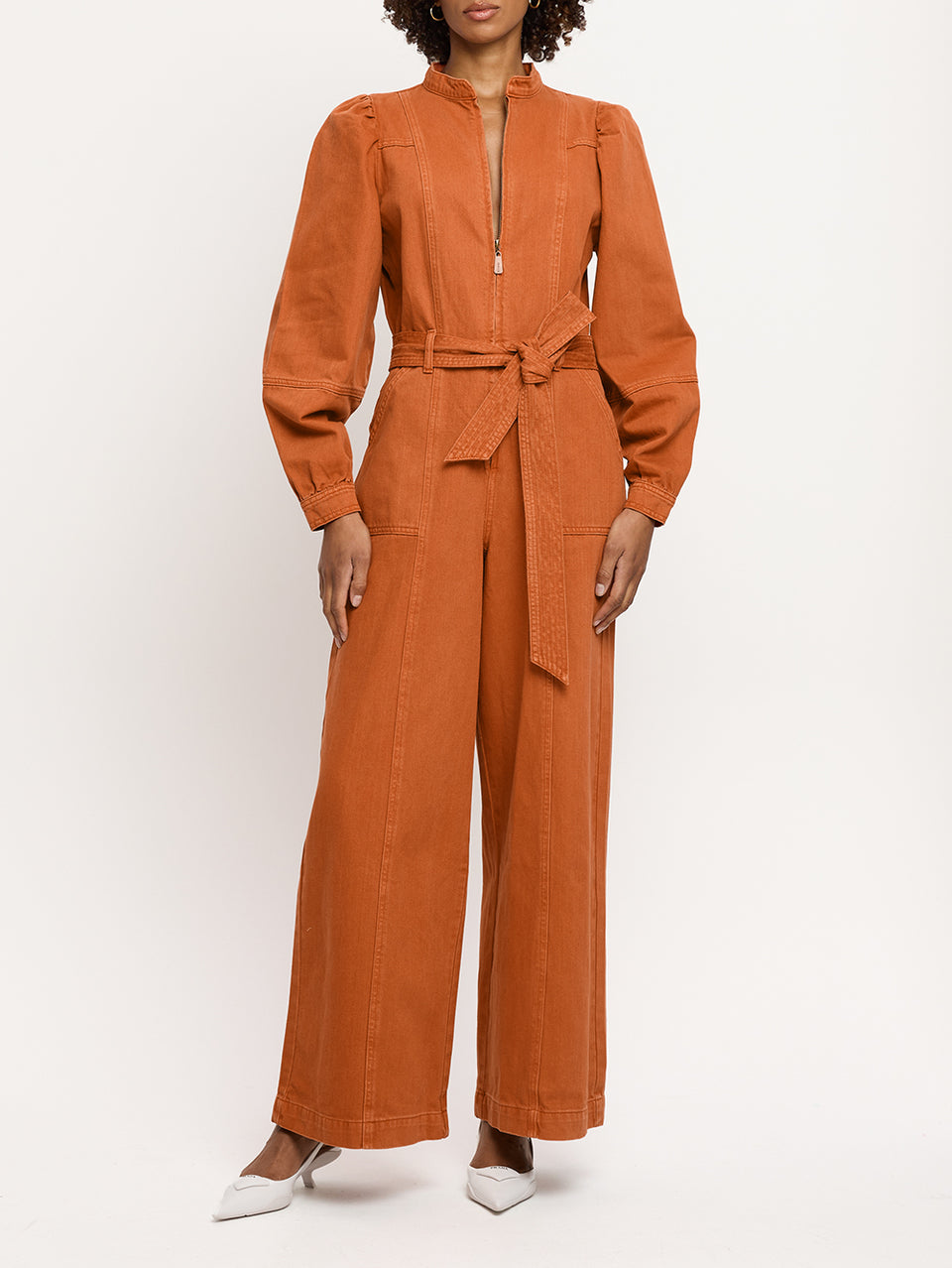 Lourdes Boilersuit Rust KIVARI | Model wears orange denim boilersuit