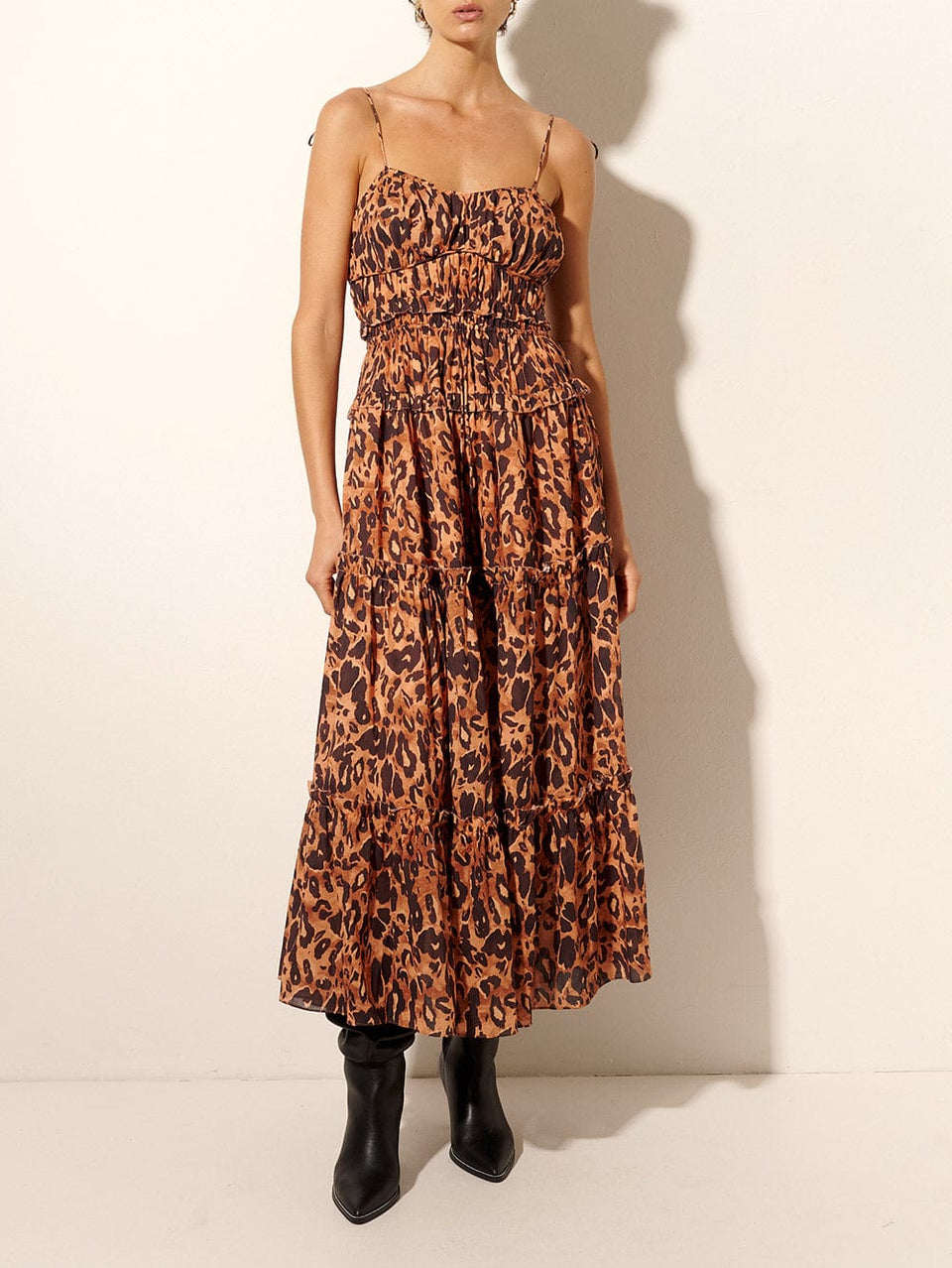 Madison Midi Dress KIVARI | Model wears orange and brown leopard midi dress