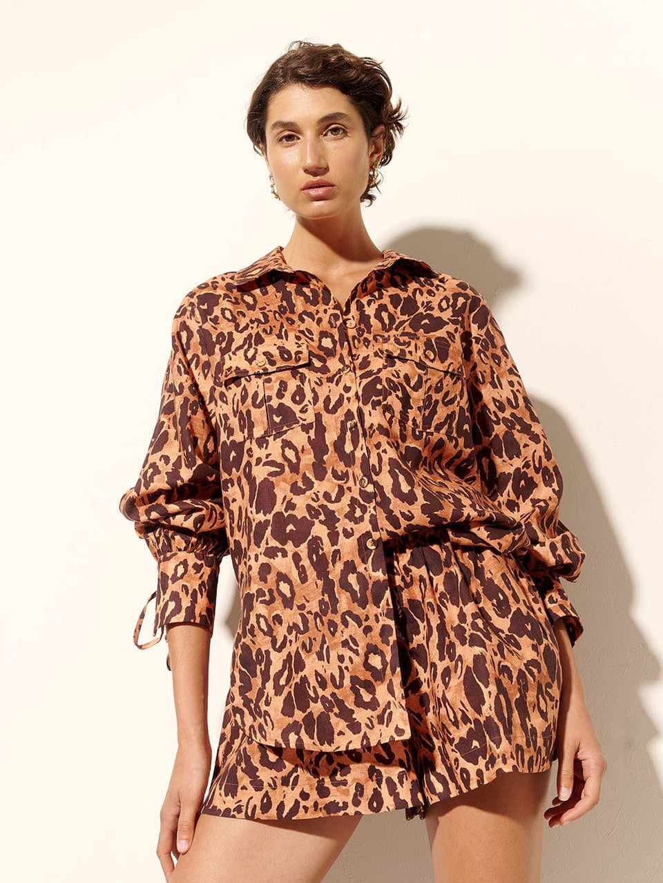 Madison Shirt KIVARI | Model wears orange and brown leopard shirt