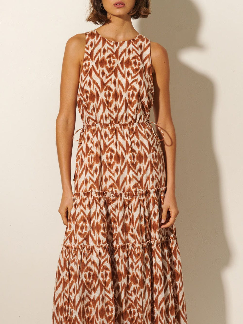 Marisa Cut Out Maxi Dress KIVARI | Model wears brown and ivory aztek printed cut out maxi dress