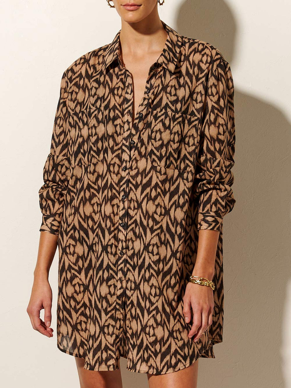Marisa Overswim Shirt Dress KIVARI | Model wears brown and ivory aztek printed overswim shirt dress close up