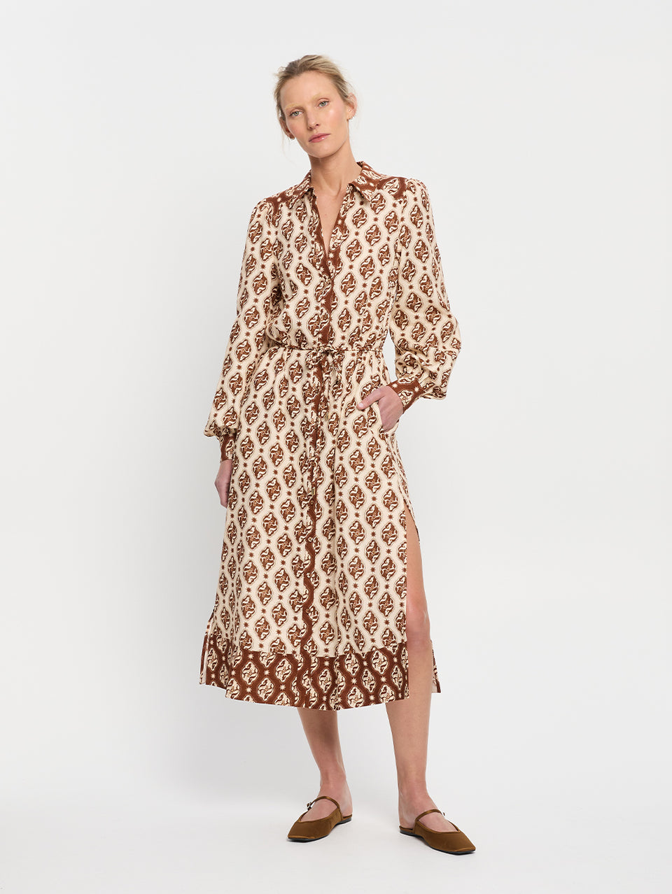 Melody Midi Dress KIVARI | Model wears brown and cream print midi dress